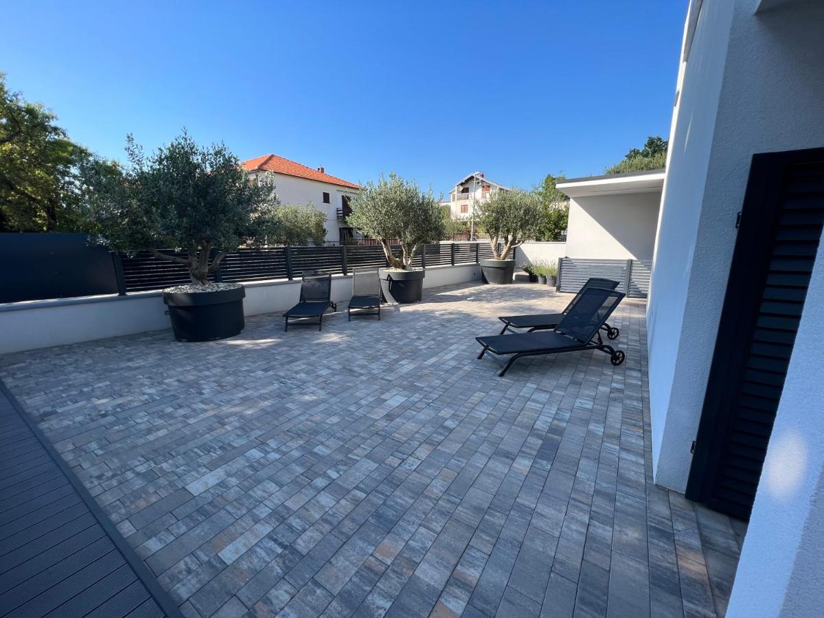 Apartmani Kumenat Biograd Na Moru Esterno foto